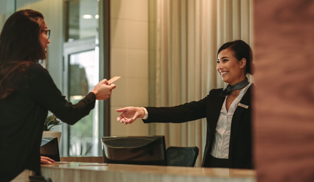 business woman hotel check-in